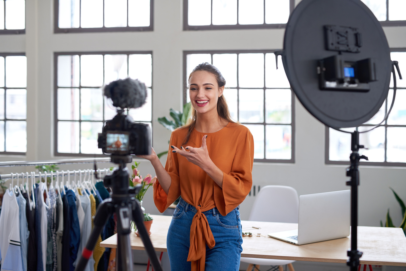 Social media influencer talking to camera for vlog